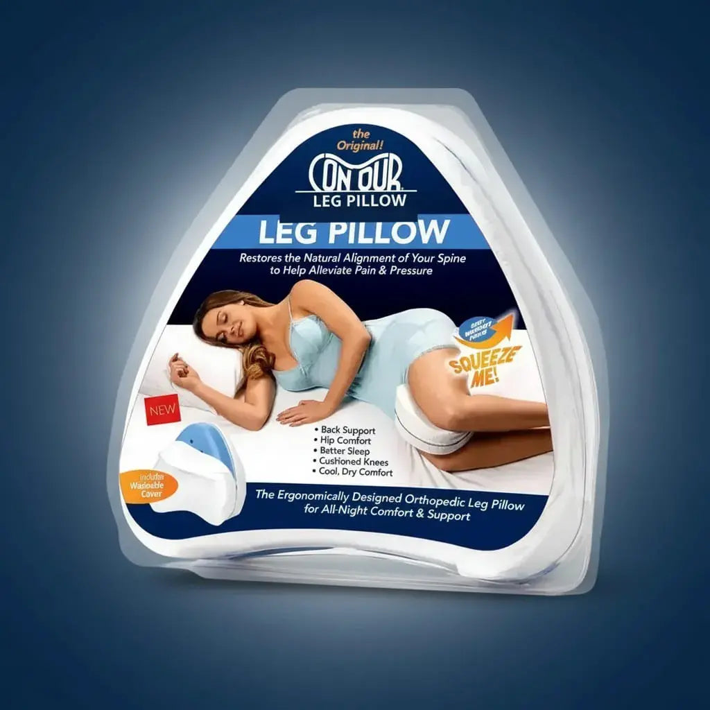 Almohada para piernas en espuma viscoelástica con forma de corazón. Se coloca entre las rodillas al dormir de lado y ayuda a mantener alineadas piernas, caderas y columna. Funda de algodón suave. Compacta y portátil.