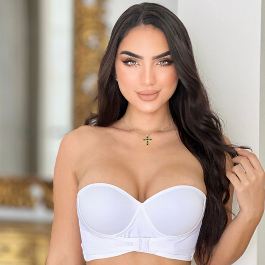 Brasier levanta busto con realce alto y copas preformadas que centran y elevan el busto. Bandas siliconadas para usarlo sin tirantes, varillas de soporte y broches ajustables delante y atrás. Lycra nylon cómoda.