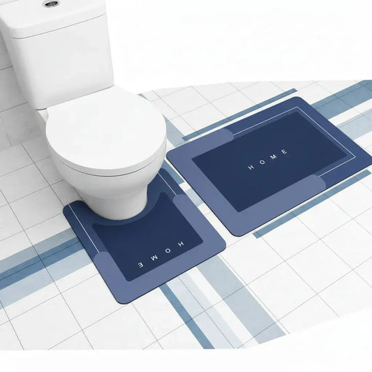 Juego de 2 tapetes para baño en espuma de memoria: rectangular de 80 x 50 cm y contorno en U de 50 x 60 cm para el sanitario. Son suaves, absorbentes y con base antideslizante. Tu baño se ve renovado y más cómodo.
