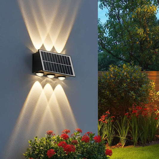 Lámpara solar LED de pared ONE PIXEL, un aplique exterior negro de diseño moderno. Tiene luz blanca, cálida o dos tonos, y hasta 8 horas de iluminación. Es resistente a la intemperie y se instala sin cables. Ideal para jardines, porches y balcones.