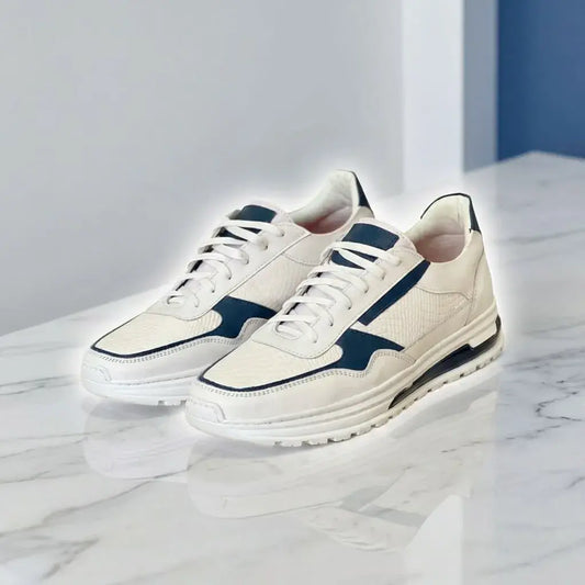 zapato sport para hombre en cuero encerado y grabado con plantilla confort, cordones encerados y suela expanso bicolor cosida. Elegante, cómodo y resistente.